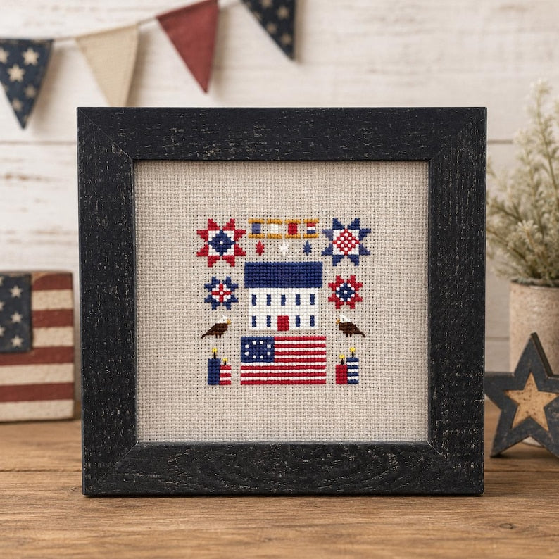 Hand-stitched Americana framed cross stitch by Nini