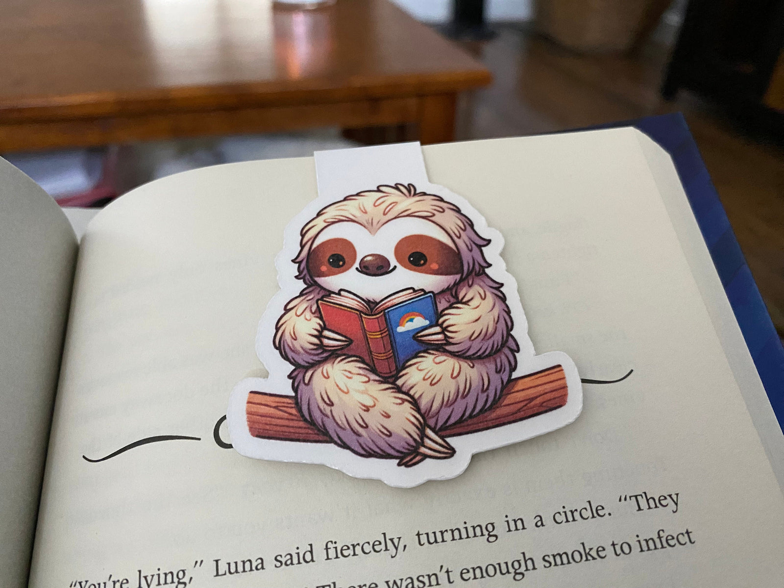 Reading sloth magnetic bookmark with cozy design