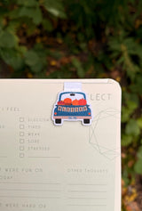 Blessed fall pumpkin truck Mini-Marks bookmark clipped to a notebook page