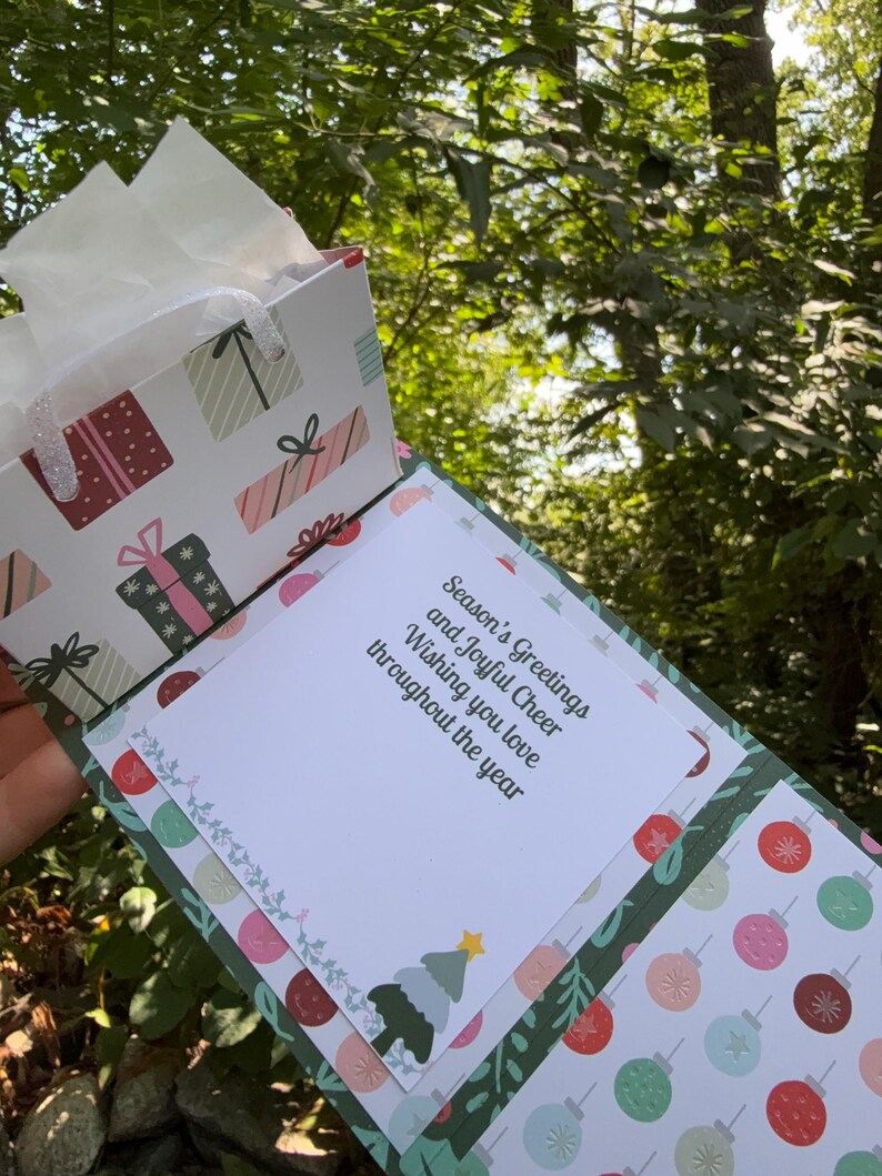 Card opened to pop-up gift bag