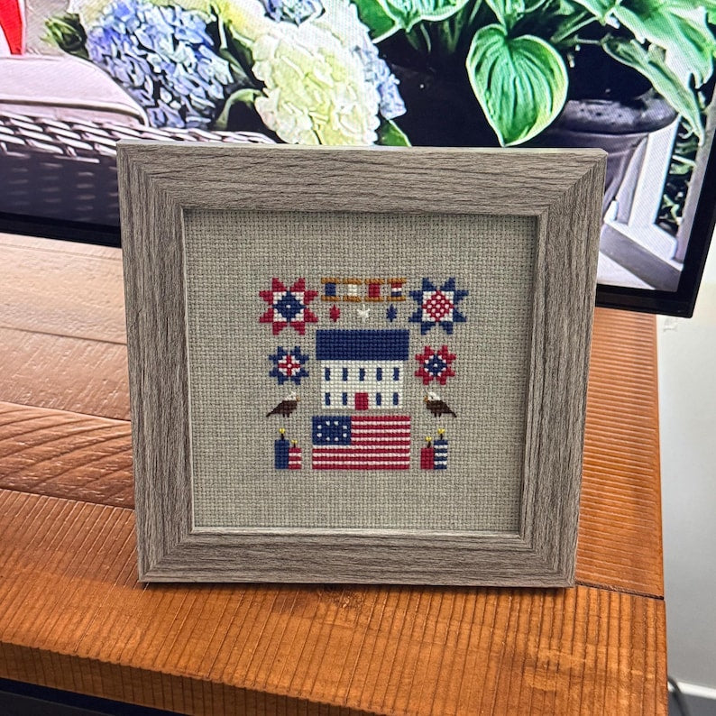 Americana cross stitch styled on display