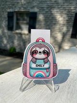 Personalized sloth in a backpack magnetic bookmark with a custom name on the backpack pocket