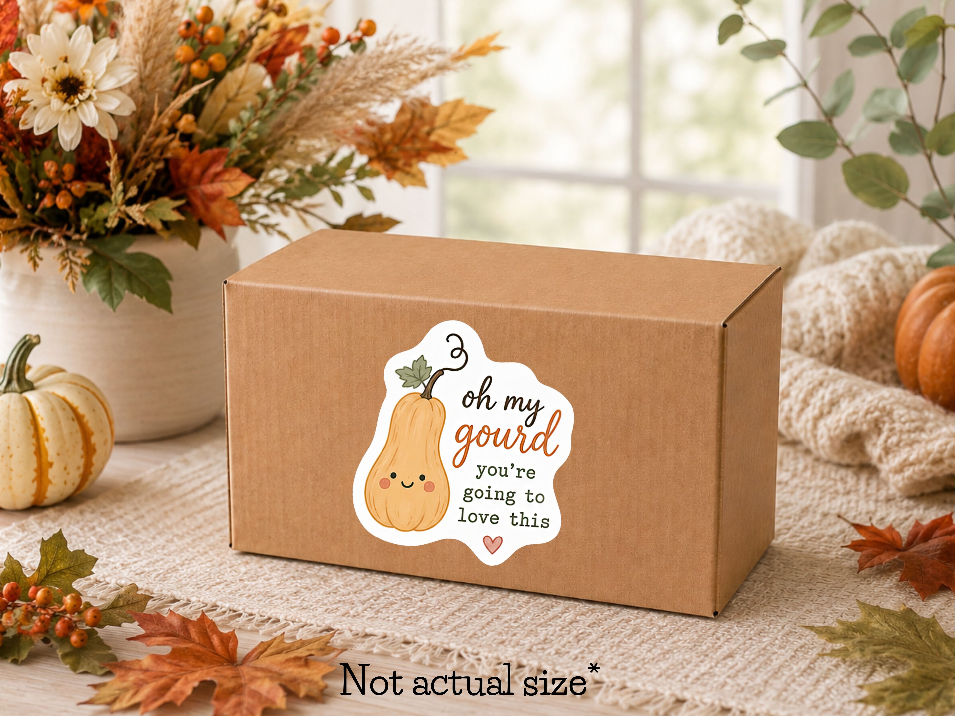 Oh My Gourd fall packaging sticker on a kraft shipping box with autumn leaves and pumpkins