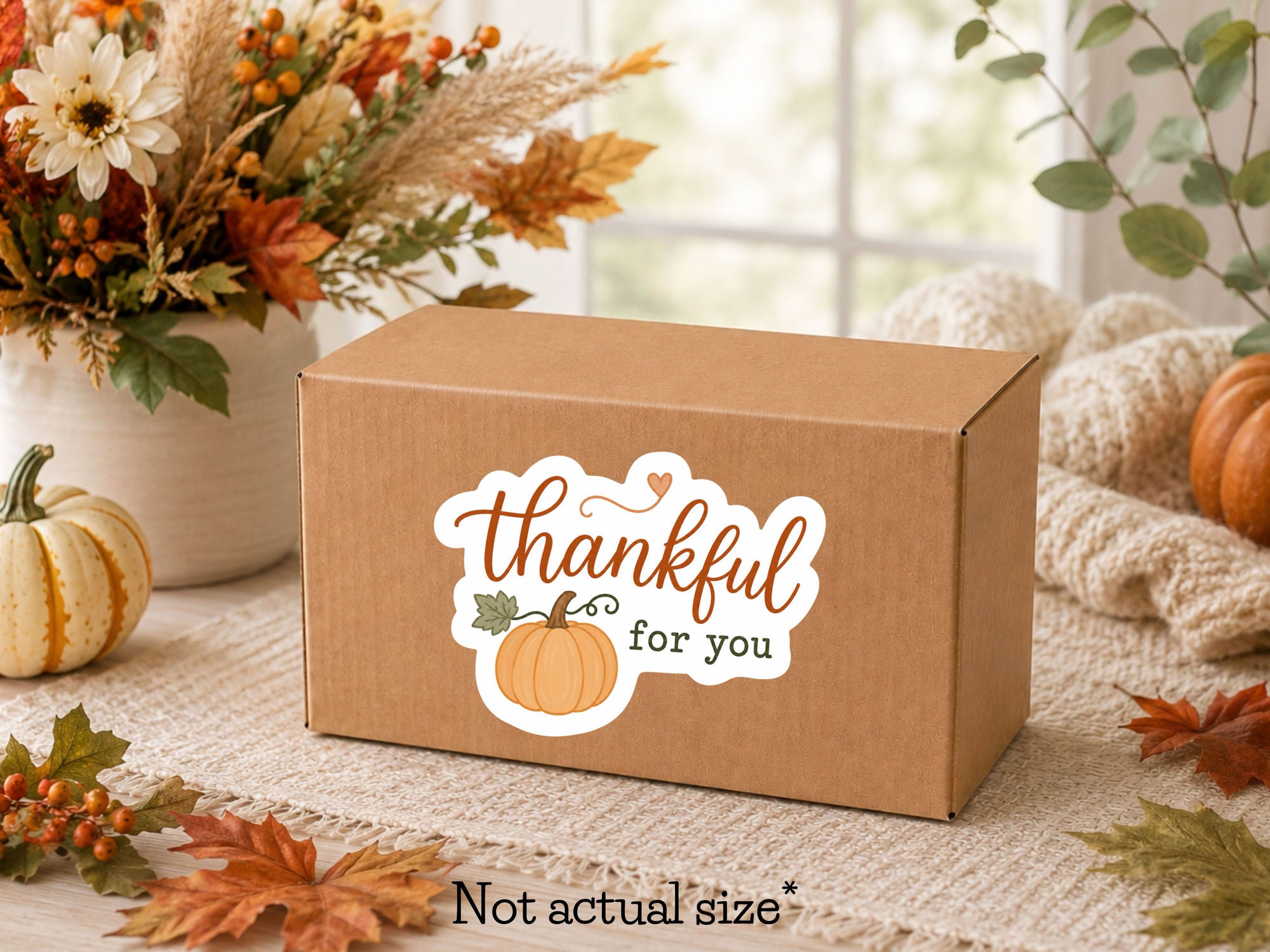 Thankful for You fall packaging sticker with a pumpkin on a kraft shipping box, autumn flowers and leaves